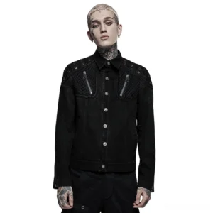 Black studded denim jacket front view with metal grommet shoulder details and mesh splice panels, worn by model