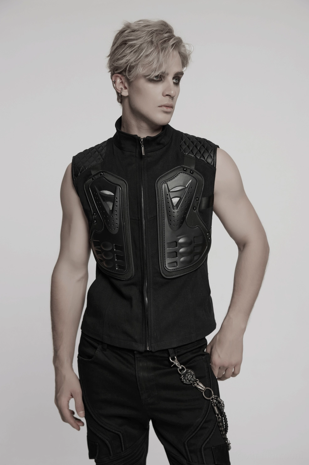 Detailed view of black tactical armor vest zipper closure and front design