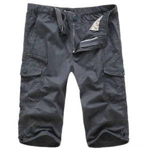 Flat lay display of grey cargo capri shorts showing zipper fly, adjustable waist strap, and reinforced pocket details