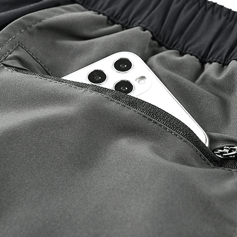 Close-up of zippered cargo pocket on tactical shorts designed for smartphone storage