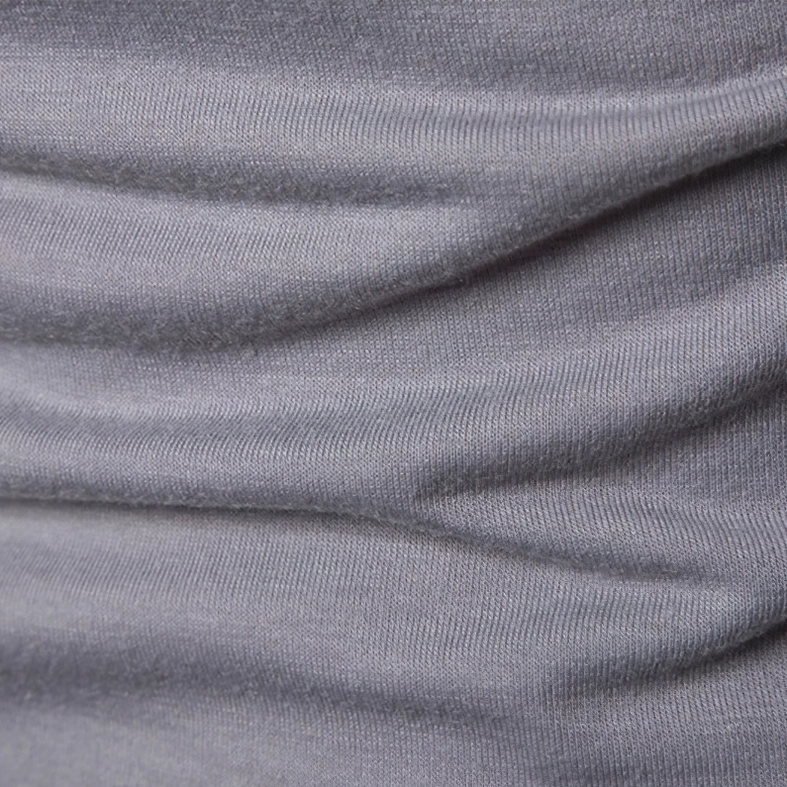 Cuff and wrist detail of black tactical sweatshirt showing fitted sleeve construction and camo pattern