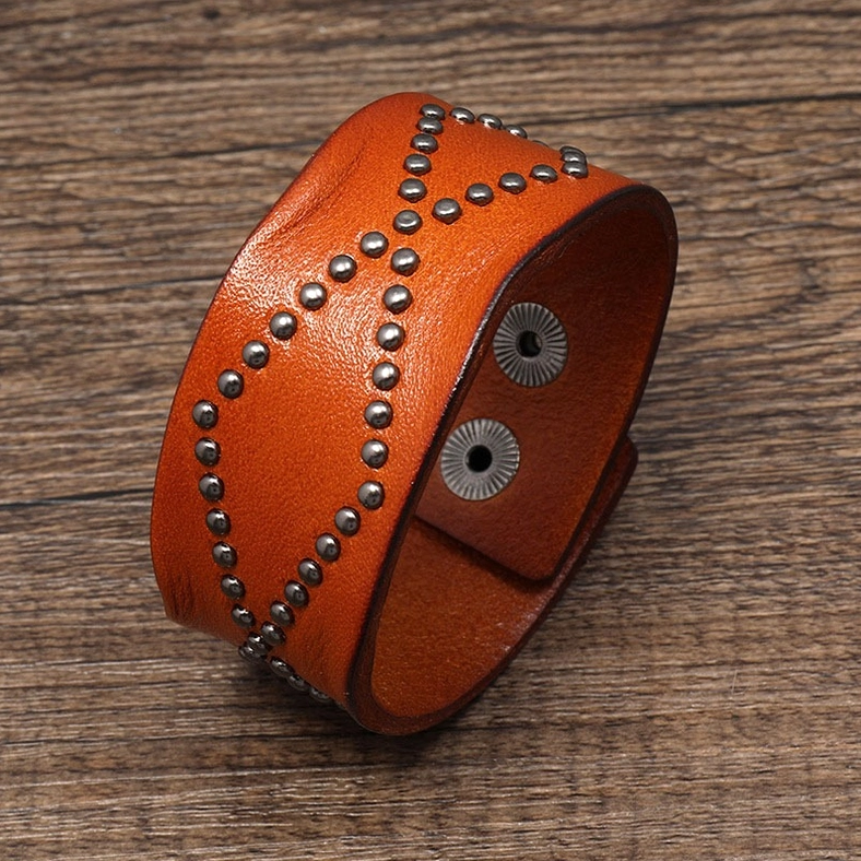 Tan brown genuine leather gothic cuff bracelet with cross rivets, architectural side view