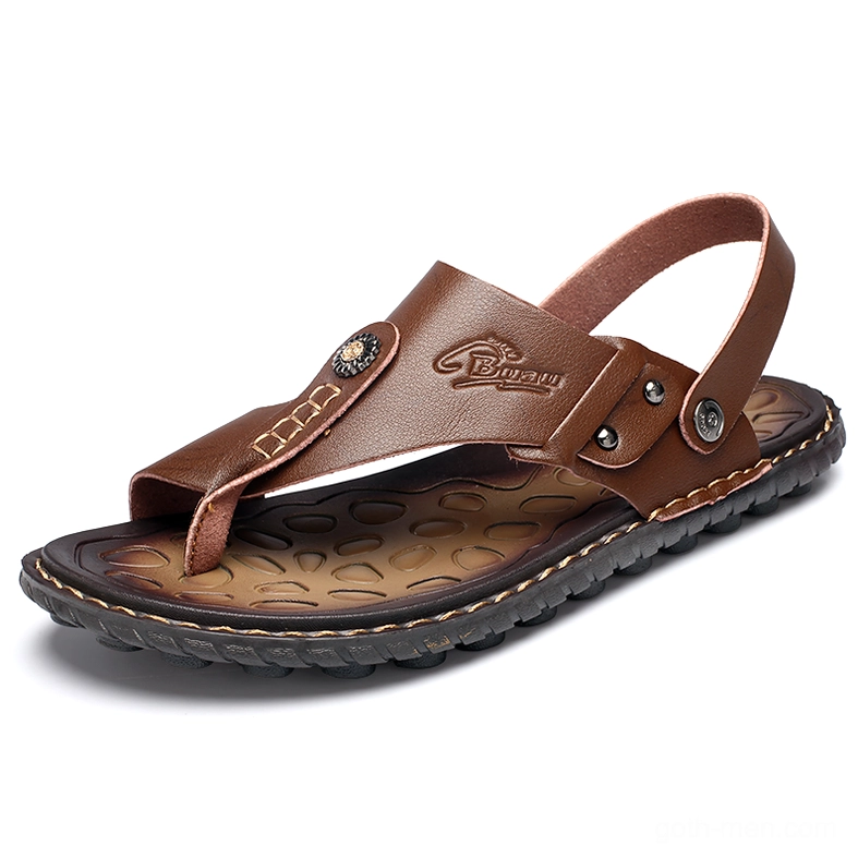 Tan brown split leather gothic sandals rubber outsole detail men's flip-flops studio shot