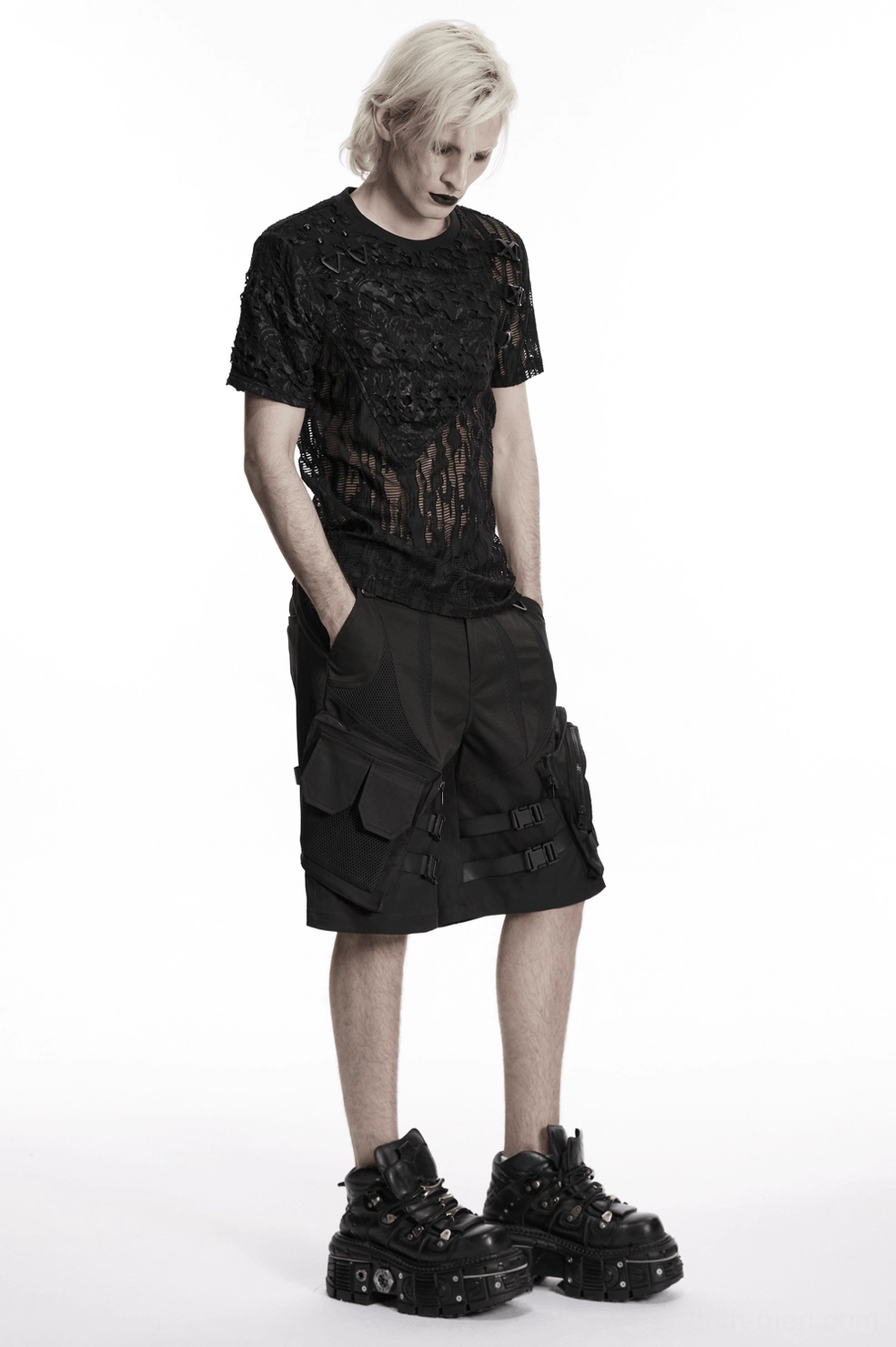 Black mesh gothic T-shirt detail shot emphasizing tattered mesh weave, fabric texture, and structural design elements