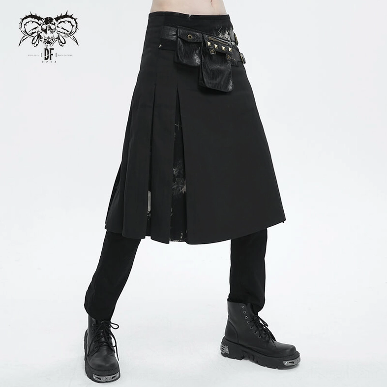 Three-quarter front view of tie-dye studded gothic kilt on model wearing combat boots, showing pleated side split and studded waist pouch