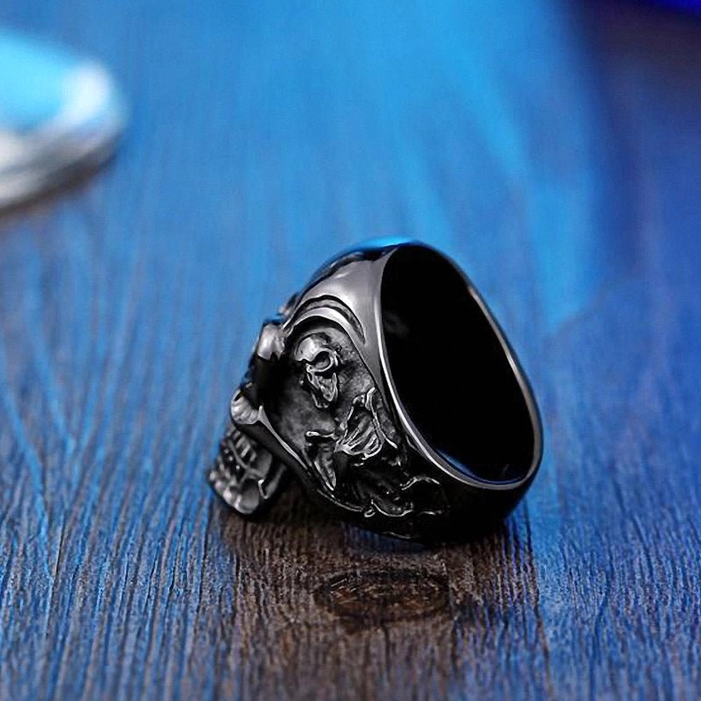 Triple skull gothic ring interior band view showing engraved side details - side profile