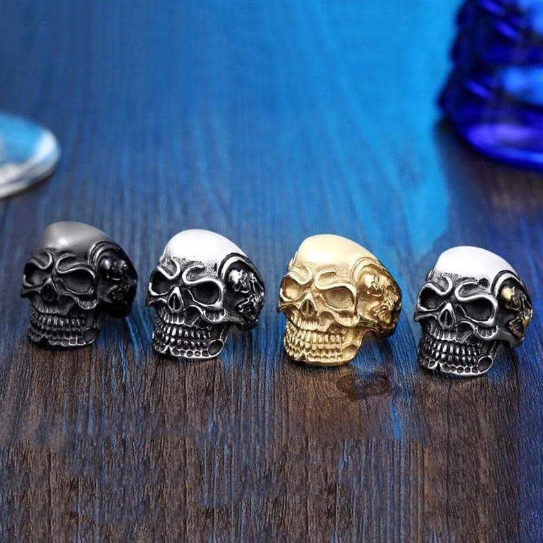 Triple skull gothic ring detailed view of skull eye socket and nasal cavity carving