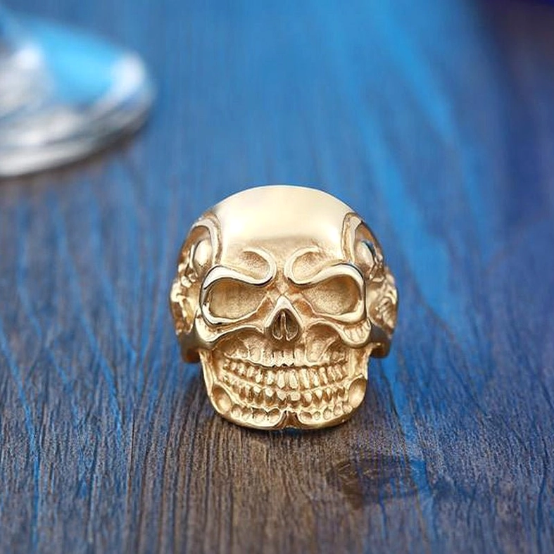 Steel color triple skull gothic ring back view showing band construction