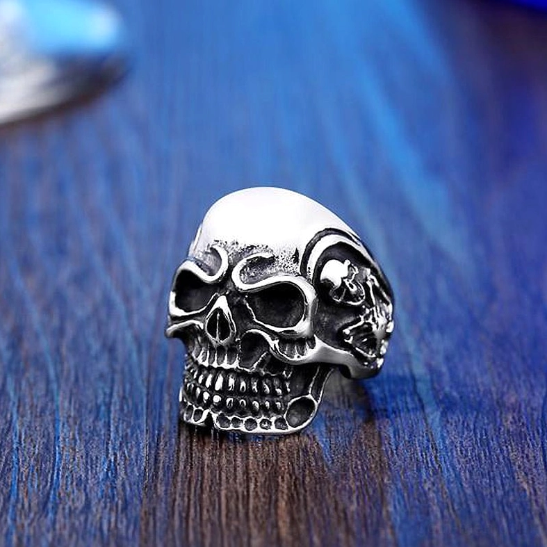 Triple skull gothic ring straight-on front view with full skull detail visibility