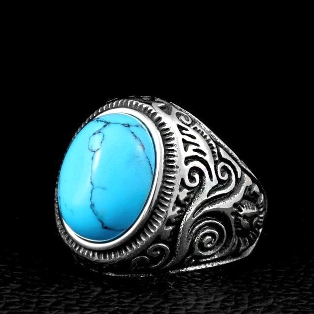 Turquoise stone gothic ring oblique angle, vintage silver finish, dark veined gemstone detail