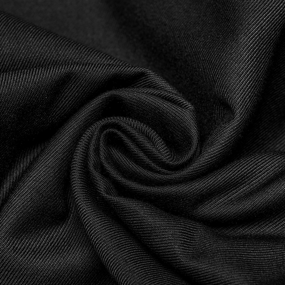 Twill weave fabric texture of black gothic cargo trousers showing soft drape and woven pattern detail
