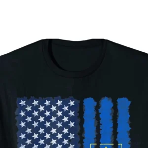 Close-up detail of watercolor style Ukrainian-American dual flag graphic print on black crew neck tshirt