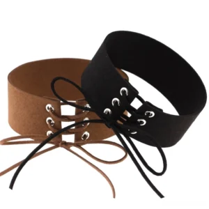 Multiple color velvet chokers displayed, black and coffee brown suede with tied bow lace-up closures