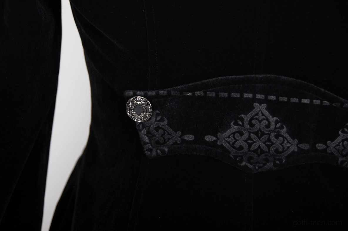 Black velvet gothic tailcoat showing texture quality and embroidered trim craftsmanship detail
