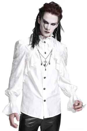 Victorian gothic white ruffled shirt with smocked bell cuffs and embroidered lace trim, modeled on male goth styling mannequin with decorative cross pendant necklace, front view
