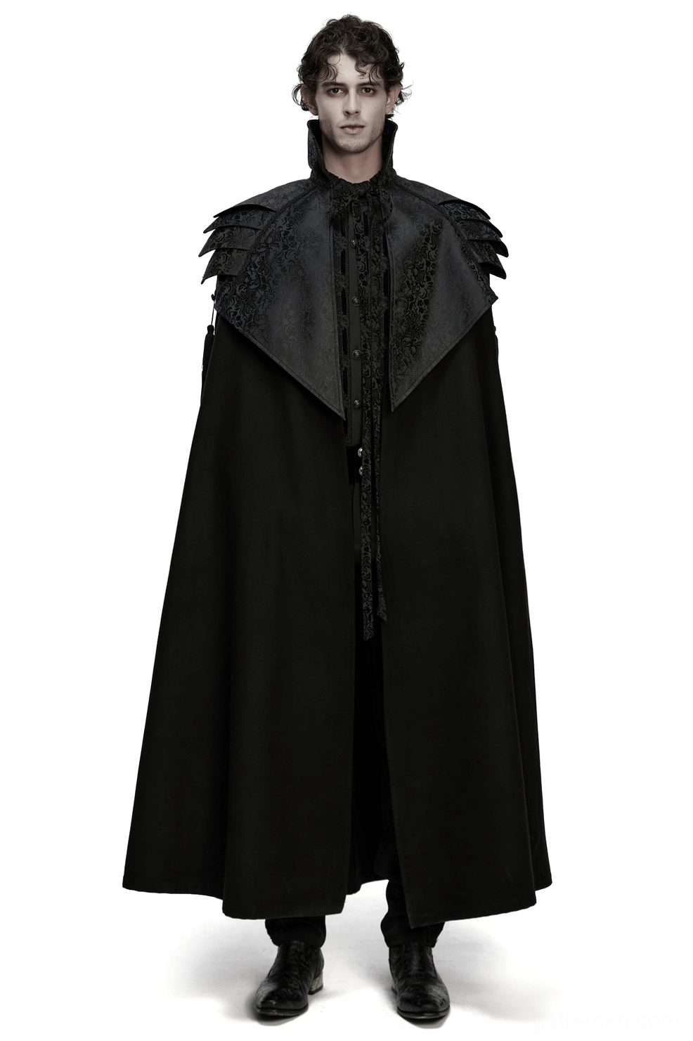 Victorian gothic shoulder armor cloak front view - male model wearing all-black structured layered shoulder pauldrons and floor-length cape