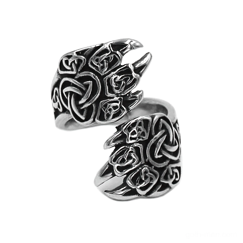Viking bear claw Celtic knot stainless steel ring - top oblique view showing intricate dual claw design with engraved Celtic knot patterns and antique silver finish
