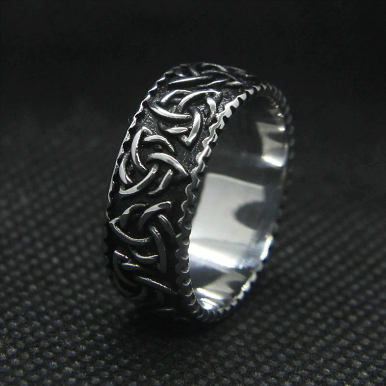 Dark silver finish Viking Celtic knot ring side view showing serrated edge borders and polished finish