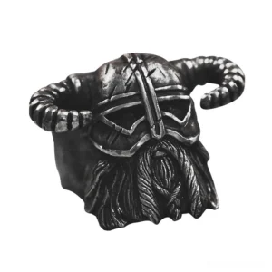 Nordic warrior helmet ring oblique side angle - weathered black metal finish with intricate carved details