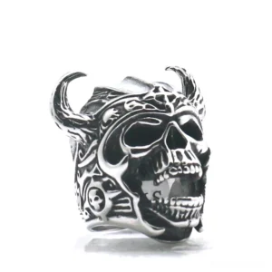 Viking skull warrior ring with horned helmet - front oblique view showing carved tribal details and vintage silver finish