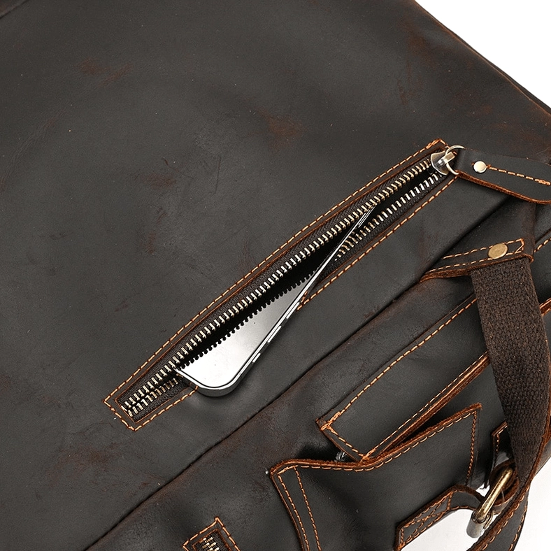 Vintage genuine leather gothic backpack showing natural patina development and aging character