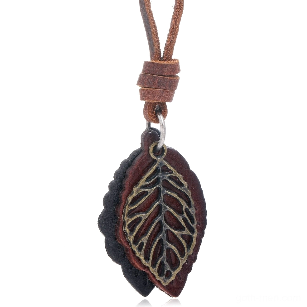 Dark vintage leather leaf pendant necklace with double layered leaves and hollow bronze metallic accents - flat lay view