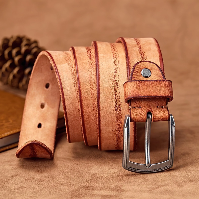 Vintage leather gothic belt with patina finish and antique alloy pin buckle, studio photography highlighting aged character and alternative fashion aesthetic