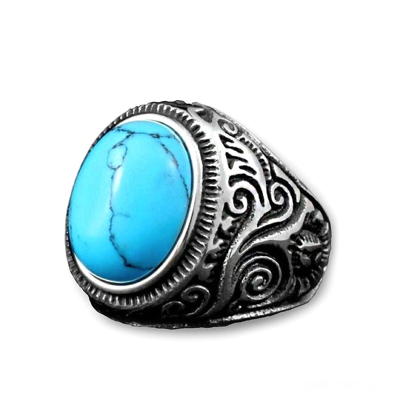 Vintage silver gothic ring with turquoise stone bezel setting, embossed scroll patterns, top flat view