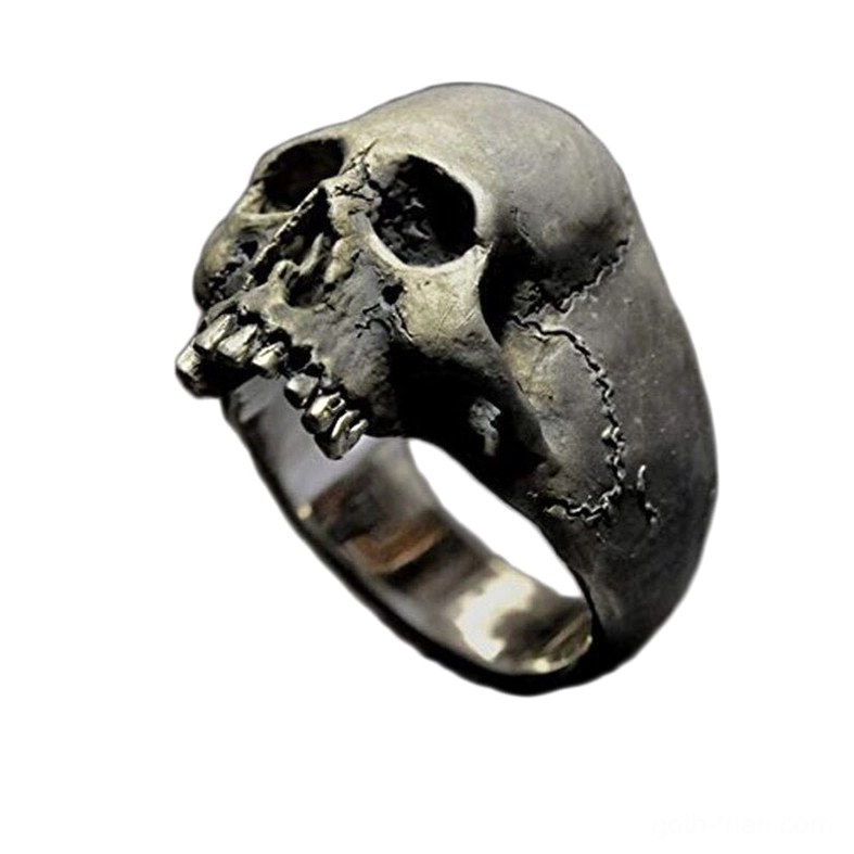 Vintage silver skull ring front overhead view with aged patina finish and detailed skull carving
