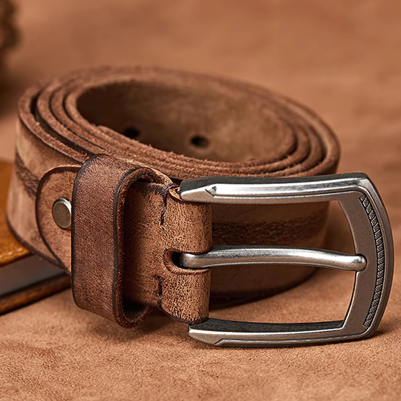 Vintage-style cowhide gothic belt featuring antique alloy buckle with engraved edge, styled photography emphasizing gothic culture and alternative fashion