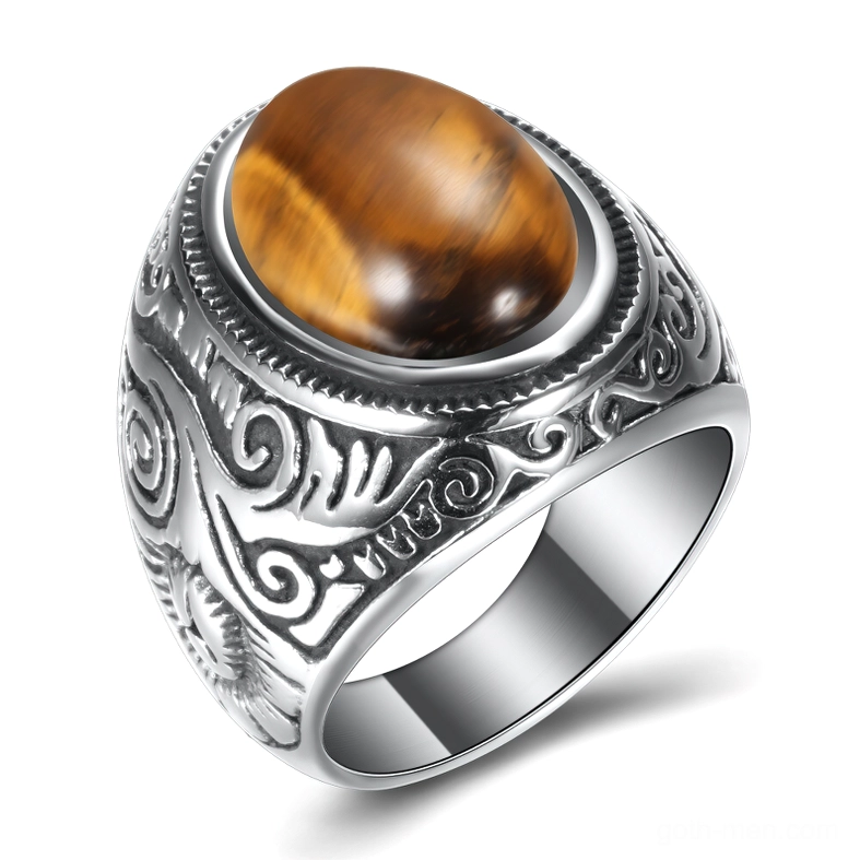 Vintage tiger's eye stone gothic ring stainless steel with hand-engraved details, three-quarter top view on white background