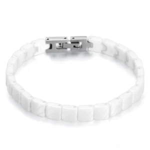 White ceramic link gothic bracelet with smooth polished finish and silver toggle clasp, studio top-down view