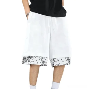 White gothic alternative shorts with side snaps and drawstring waist, front model view for casual streetwear styling