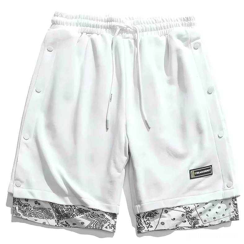 White alternative shorts flat lay featuring side snap closures and drawstring waist for gothic styling