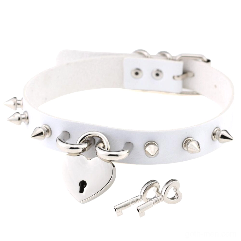 White gothic heart lock spike choker with silver hardware and matching key pendant flat lay