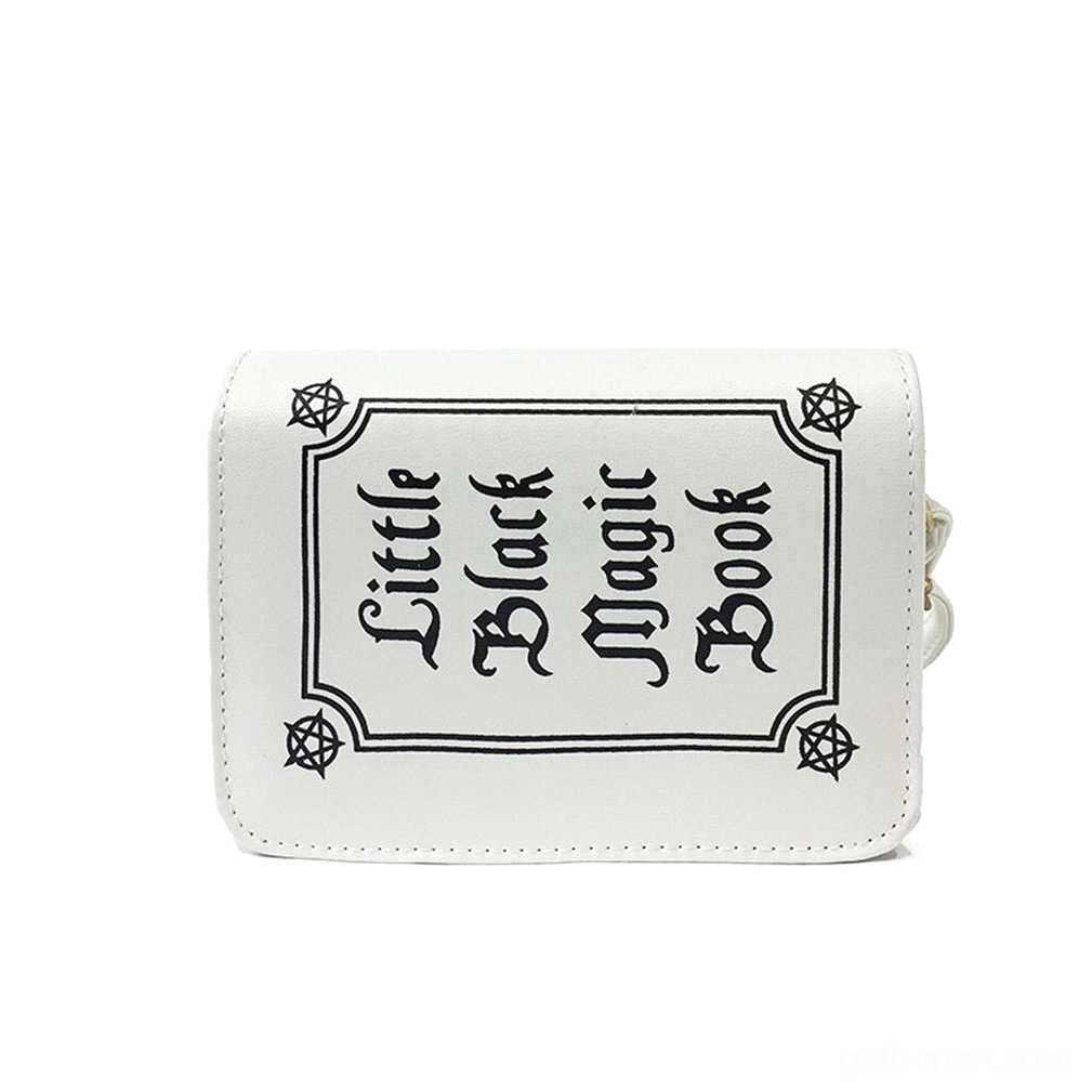 White gothic letter crossbody bag with black text print and pentagram details, top-down flat lay view