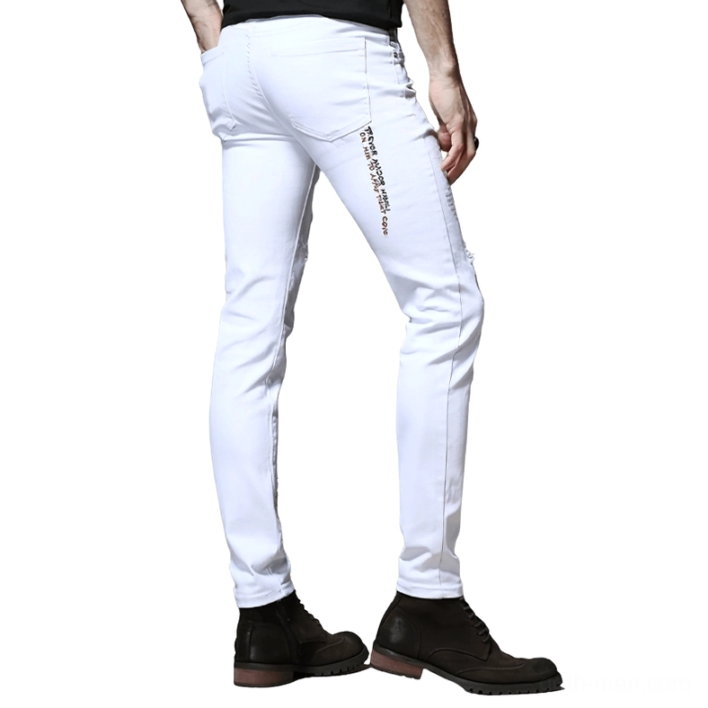 White gothic slim ripped jeans rear side view with letter prints worn by male model