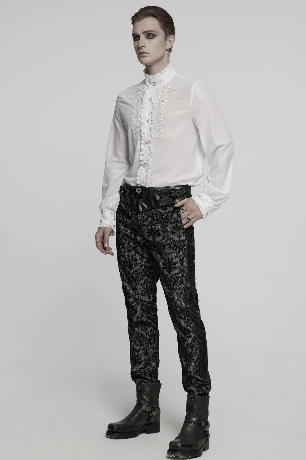 White gothic dress shirt flat lay showing ornate gem button details, ruffled placket, and overall aristocratic design