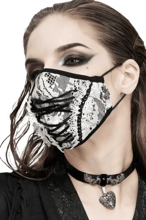 White lace gothic face mask with black corset lace-up front and delicate floral lace detail, side profile close-up worn by model with gothic makeup
