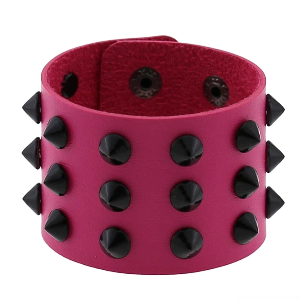 White vegan leather spike studded bracelet front view showing metallic cone spike contrast
