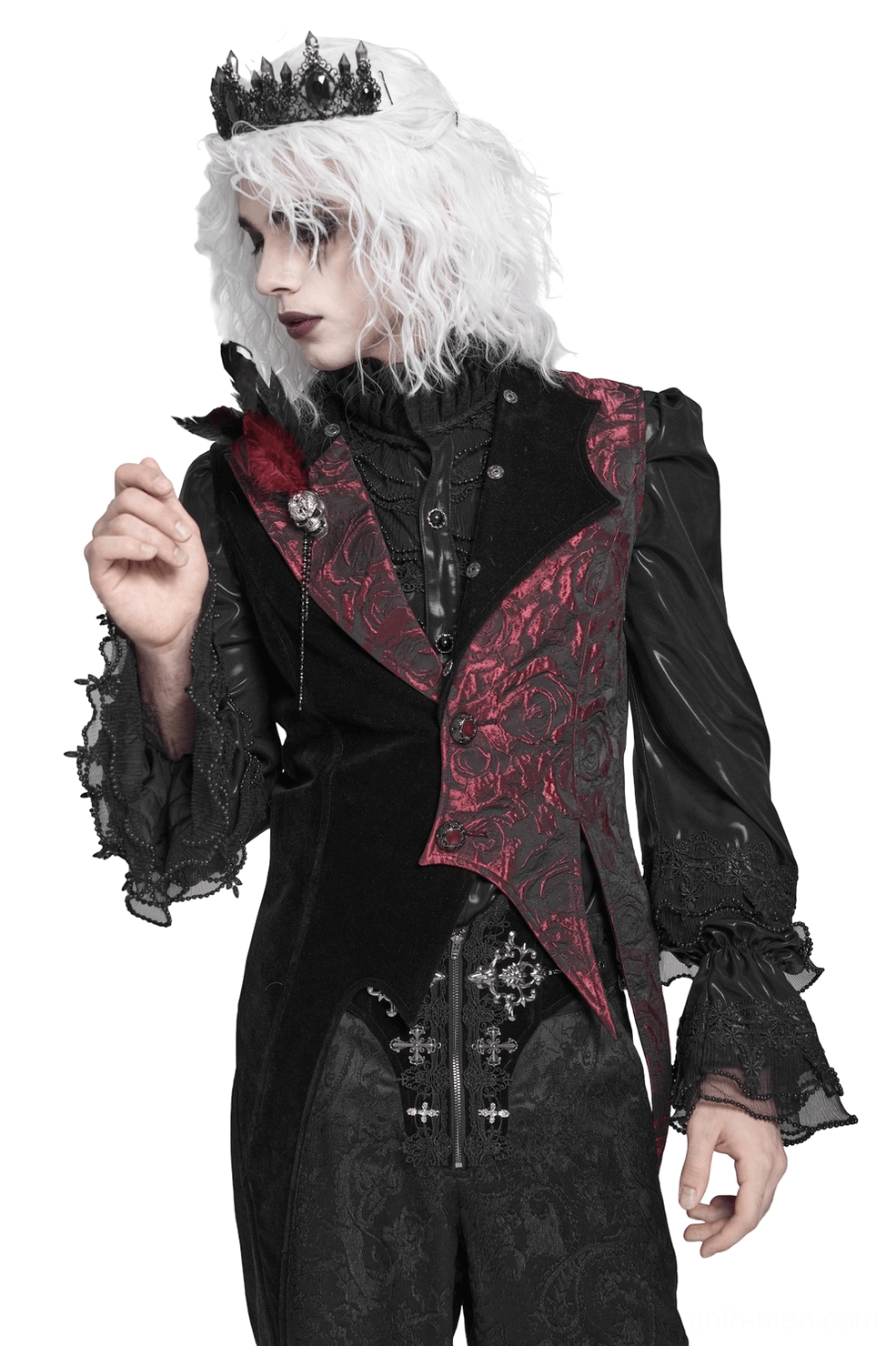 Male model wearing wine red and black jacquard gothic waistcoat with feather lapel and skull brooch, front three-quarter view with crown and white wig