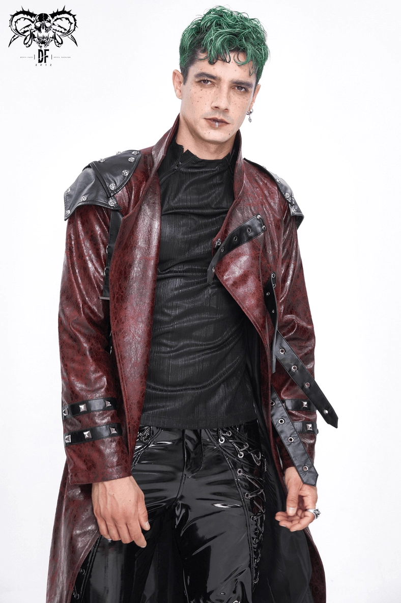 Wine red gothic trench coat showing architectural buckle placement and structured fit