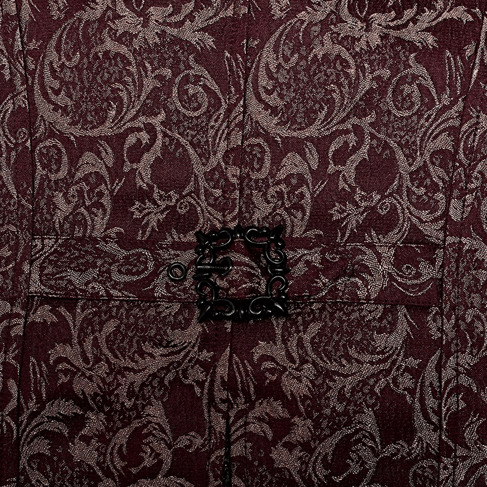 Close-up detail of wine red damask Gothic waistcoat showing adjustable black metal buckle against burgundy jacquard texture
