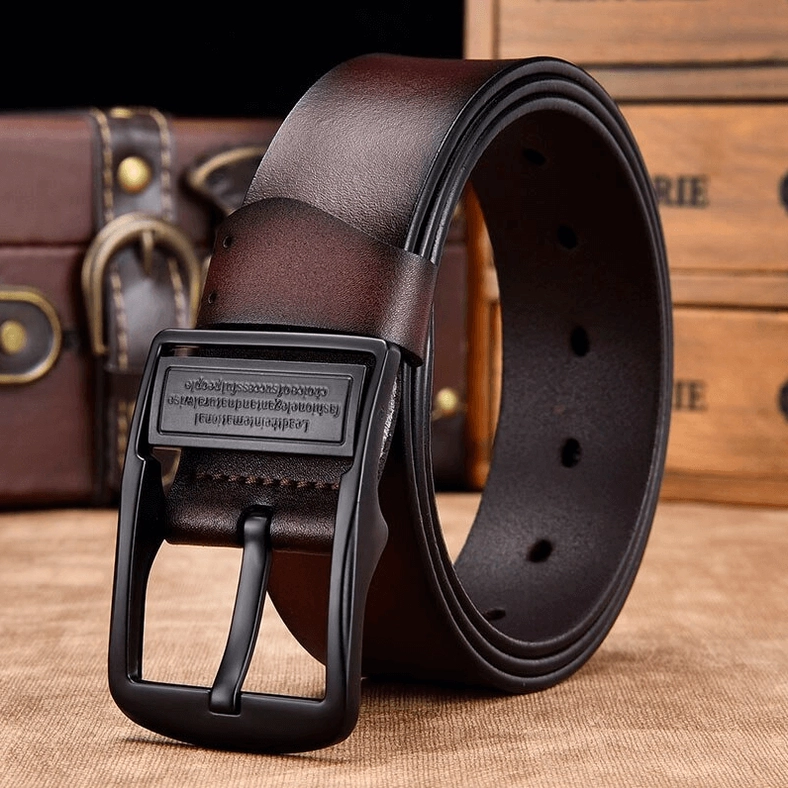 Wine red gothic leather belt with faded vintage leather tone, showing punched sizing holes