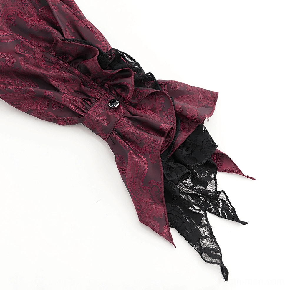 Close-up detail of wine red Victorian gothic shirt ruffled lace cuff with fabric button and delicate lace trim