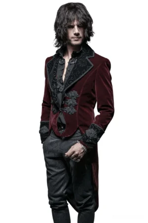 Wine red gothic tailcoat jacket front three-quarter view with black embroidered lapels and decorative frog fasteners on white studio background