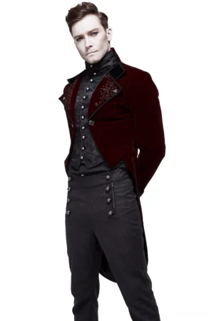 Wine red velvet gothic tailcoat worn by male model in front three-quarter view, showing embroidered lapel details and formal steampunk aesthetic