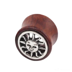 Wine red bamboo wood ear flesh tunnels with carved celestial sun face detail front view
