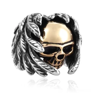 Winged skull gothic ring side view featuring silver feather wings and gold skull with two-tone metal finish