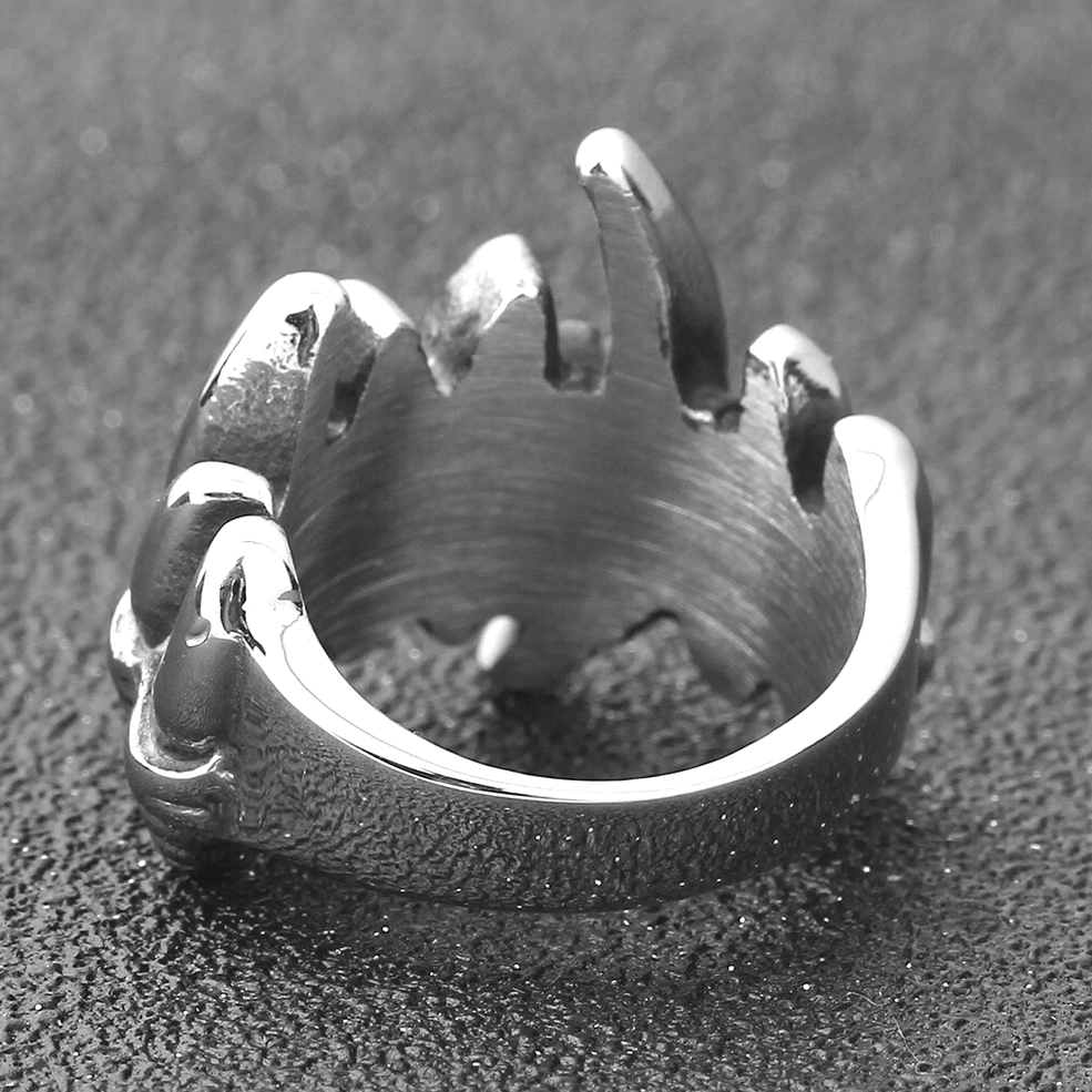 Side profile of wolf claw ring showing ridged band surface and silver stainless steel finish